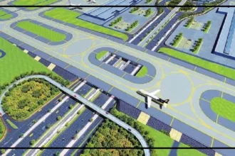 Navi Mumbai International Airport terminal with an aircraft on the apron